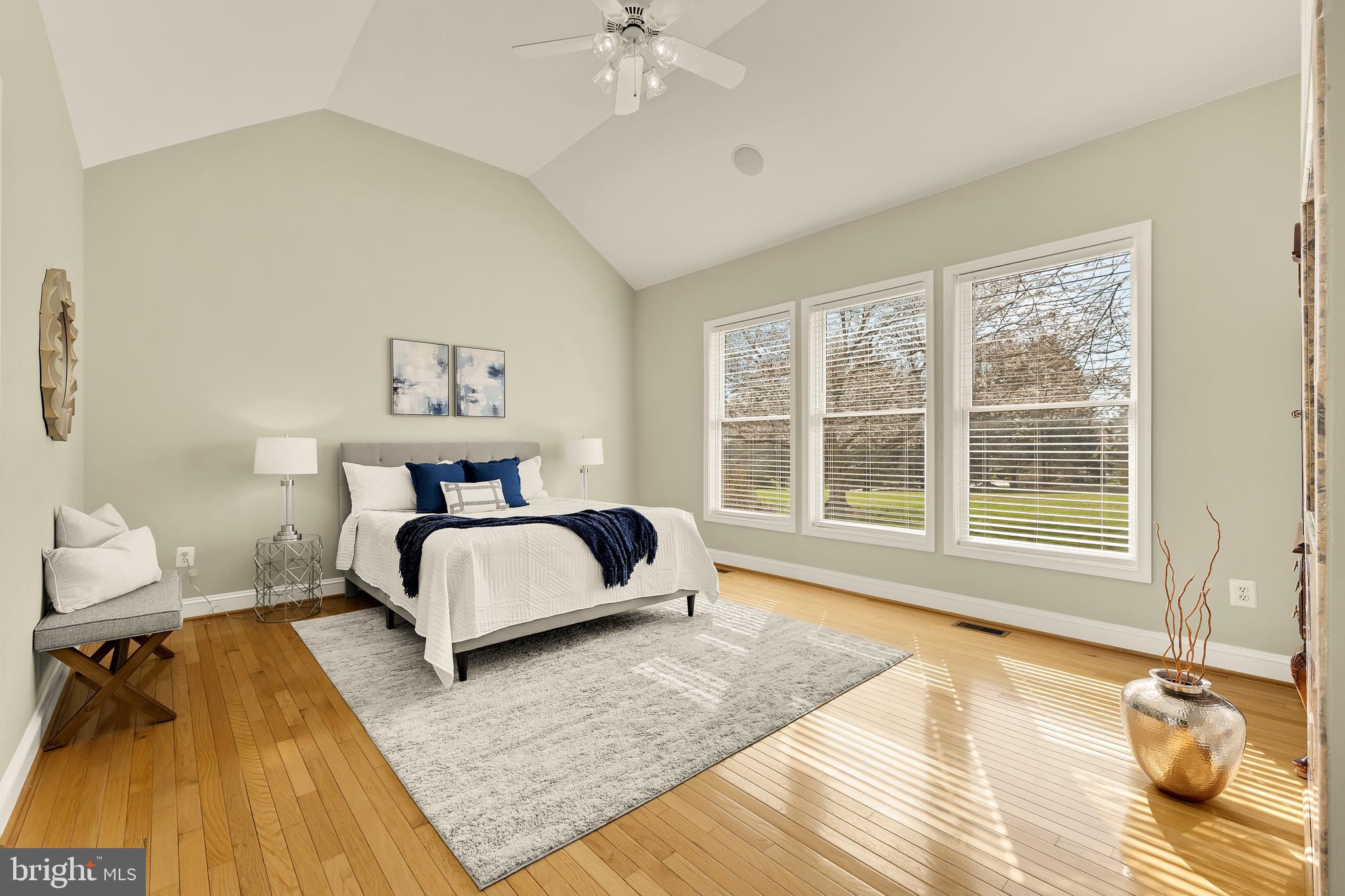 20407 Peach Tree Road Dickerson, MD 20842 - Photo 21 of 53 a spacious bedroom with a bed and wooden floor