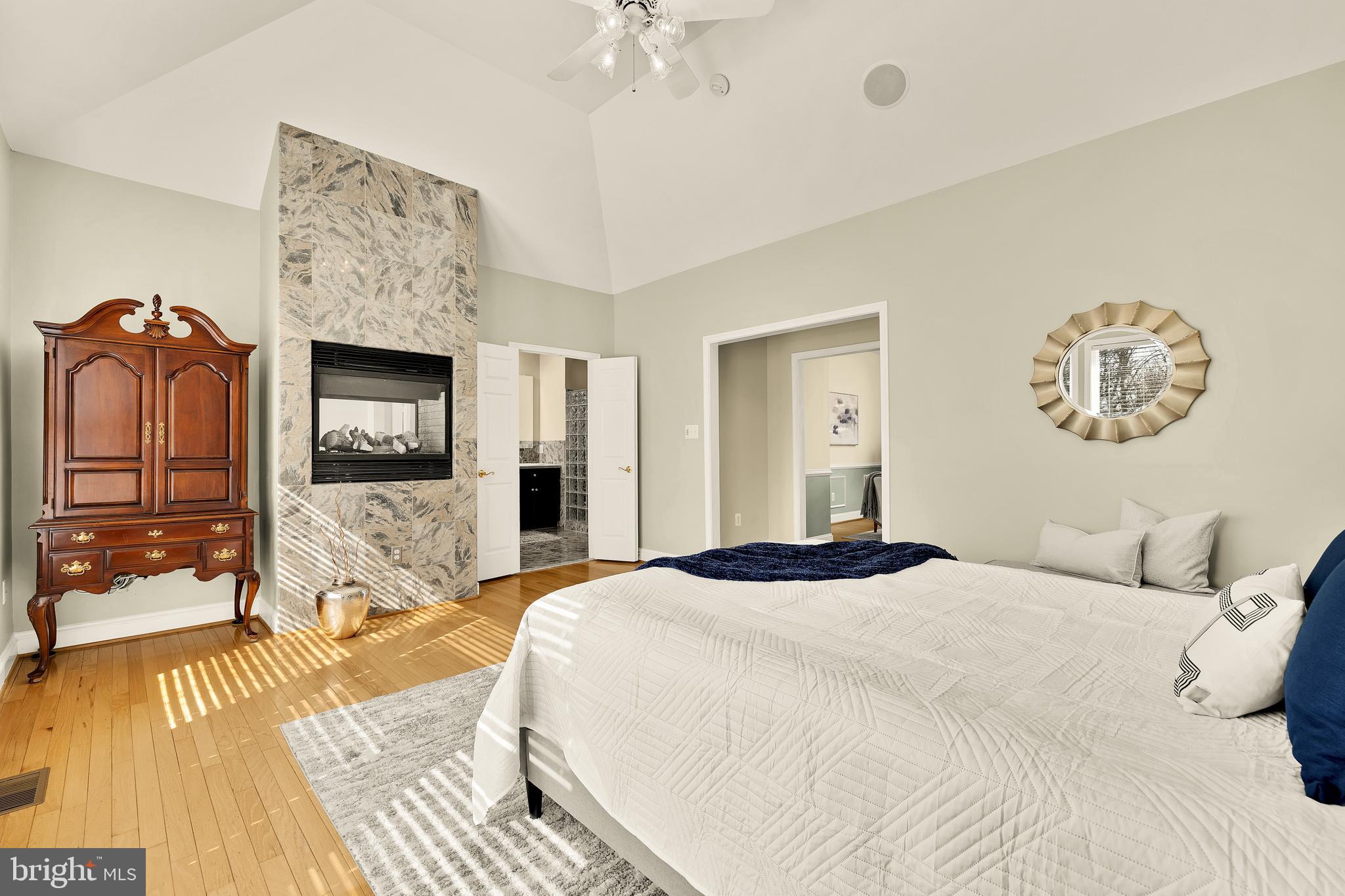 20407 Peach Tree Road Dickerson, MD 20842 - Photo 22 of 53 a bedroom with a bed and a chandelier