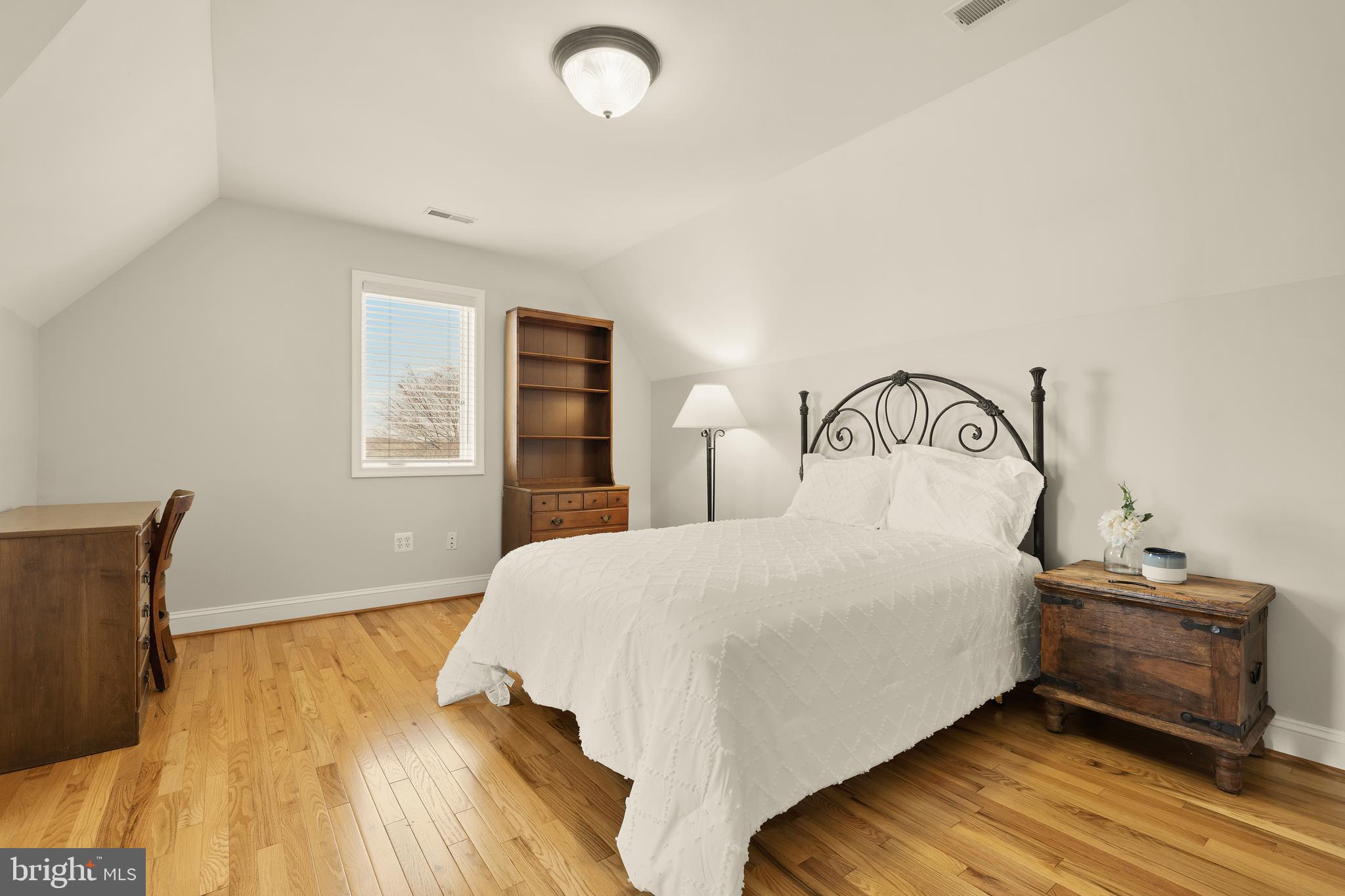 20407 Peach Tree Road Dickerson, MD 20842 - Photo 35 of 53 a bedroom with a bed and wooden floor