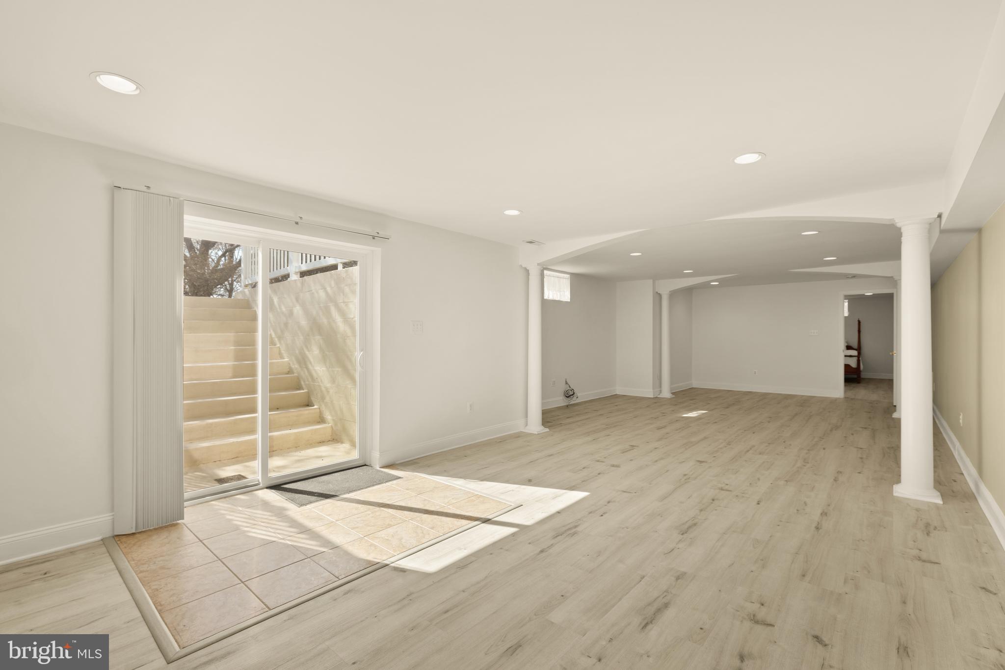 20407 Peach Tree Road Dickerson, MD 20842 - Photo 39 of 53 a view of a room with wooden floor and white walls