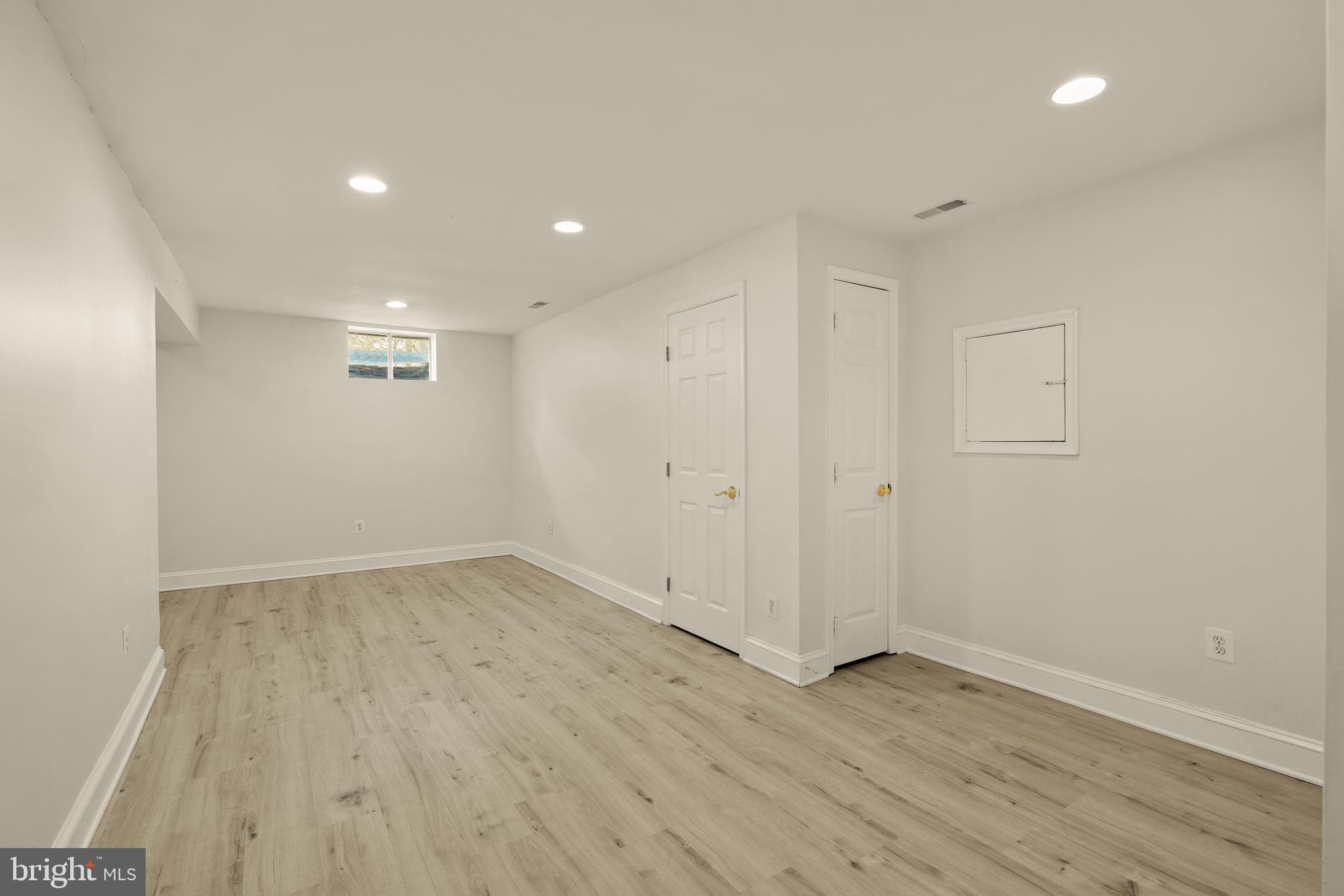 20407 Peach Tree Road Dickerson, MD 20842 - Photo 46 of 53 a view of an empty room with wooden floor