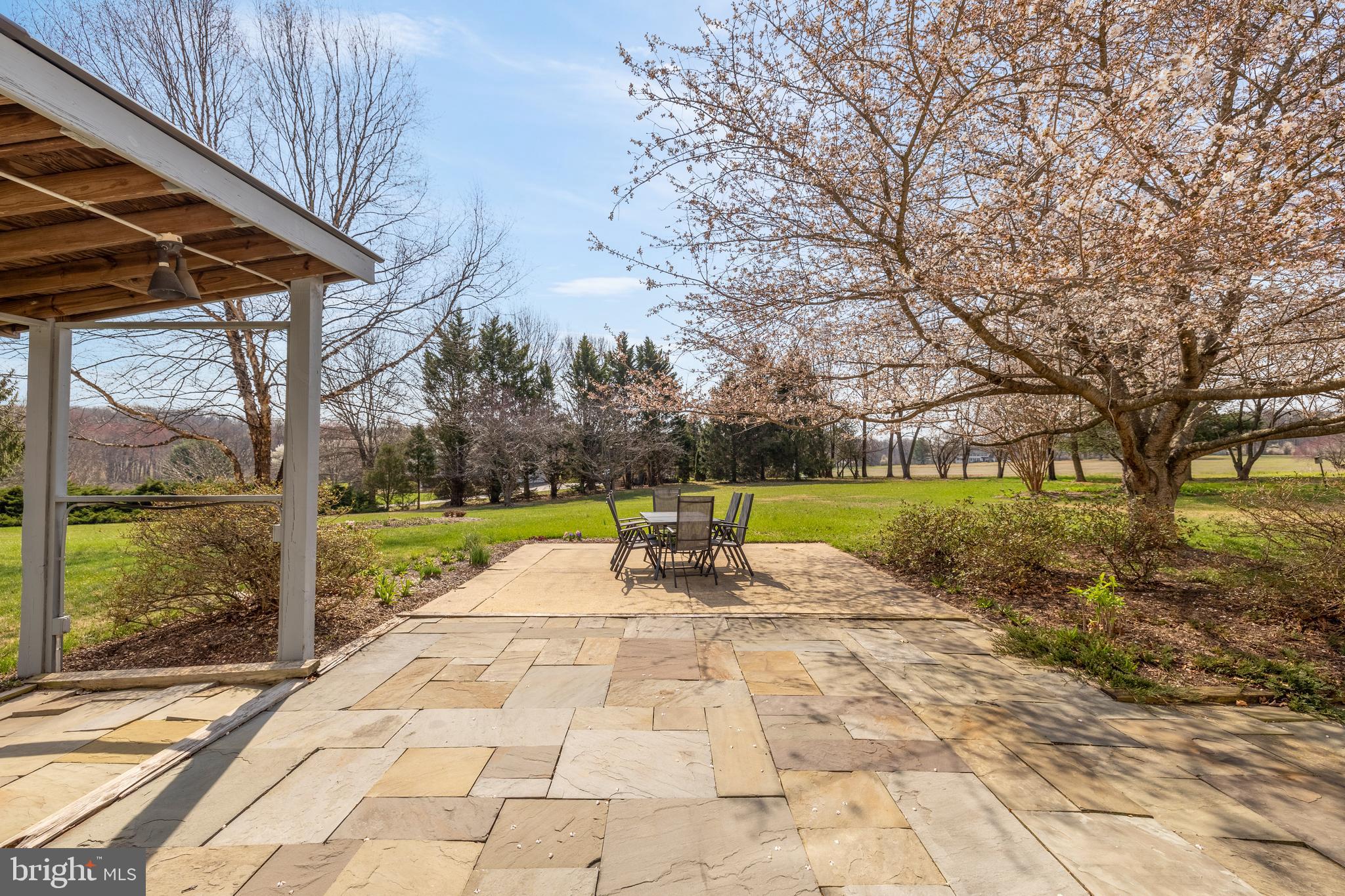 20407 Peach Tree Road Dickerson, MD 20842 - Photo 50 of 53 a view of swimming pool with sitting area and garden