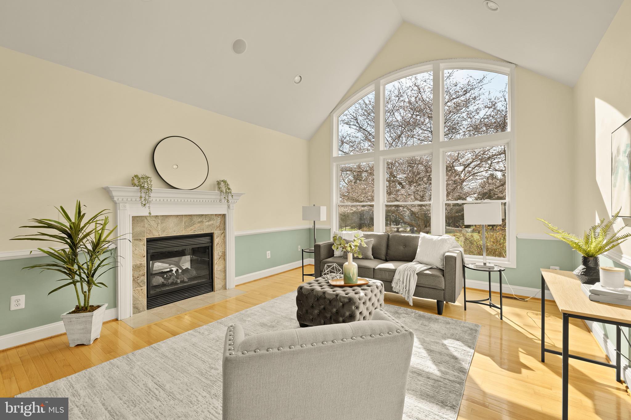20407 Peach Tree Road Dickerson, MD 20842 - Photo 5 of 53 a living room with furniture a large window and a fireplace