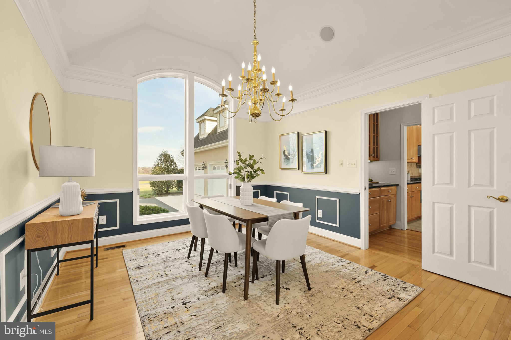 20407 Peach Tree Road Dickerson, MD 20842 - Photo 7 of 53 a view of a dining room with furniture and wooden floor