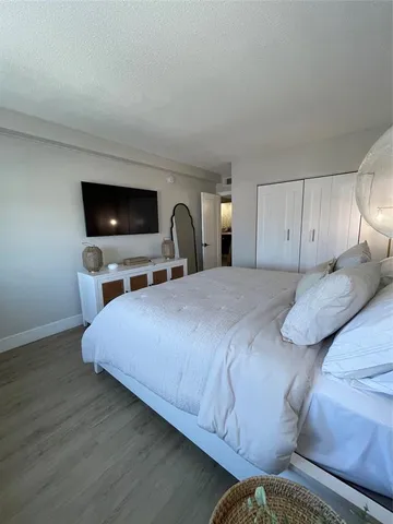 a view of swimming pool from a balcony