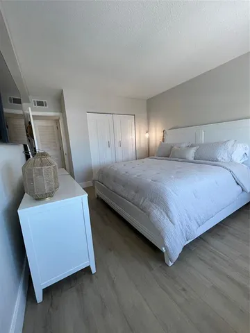 a view of a street with cars on road