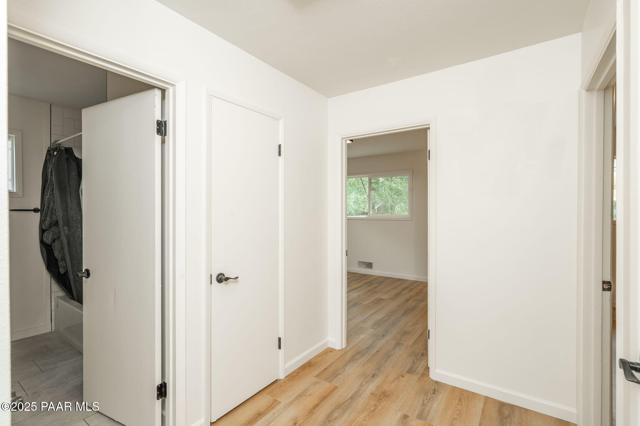 1213 Stetson Road Prescott, AZ 86303 - Photo 16 of 34 a view of a hallway with wooden floor and closet