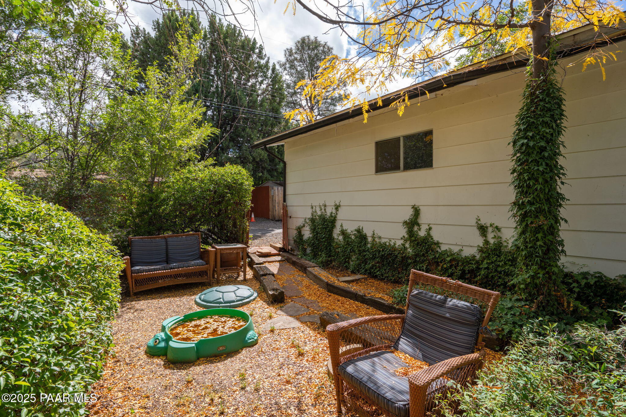 1213 Stetson Road Prescott, AZ 86303 - Photo 31 of 34 a backyard of a house with lots of green space and outdoor seating