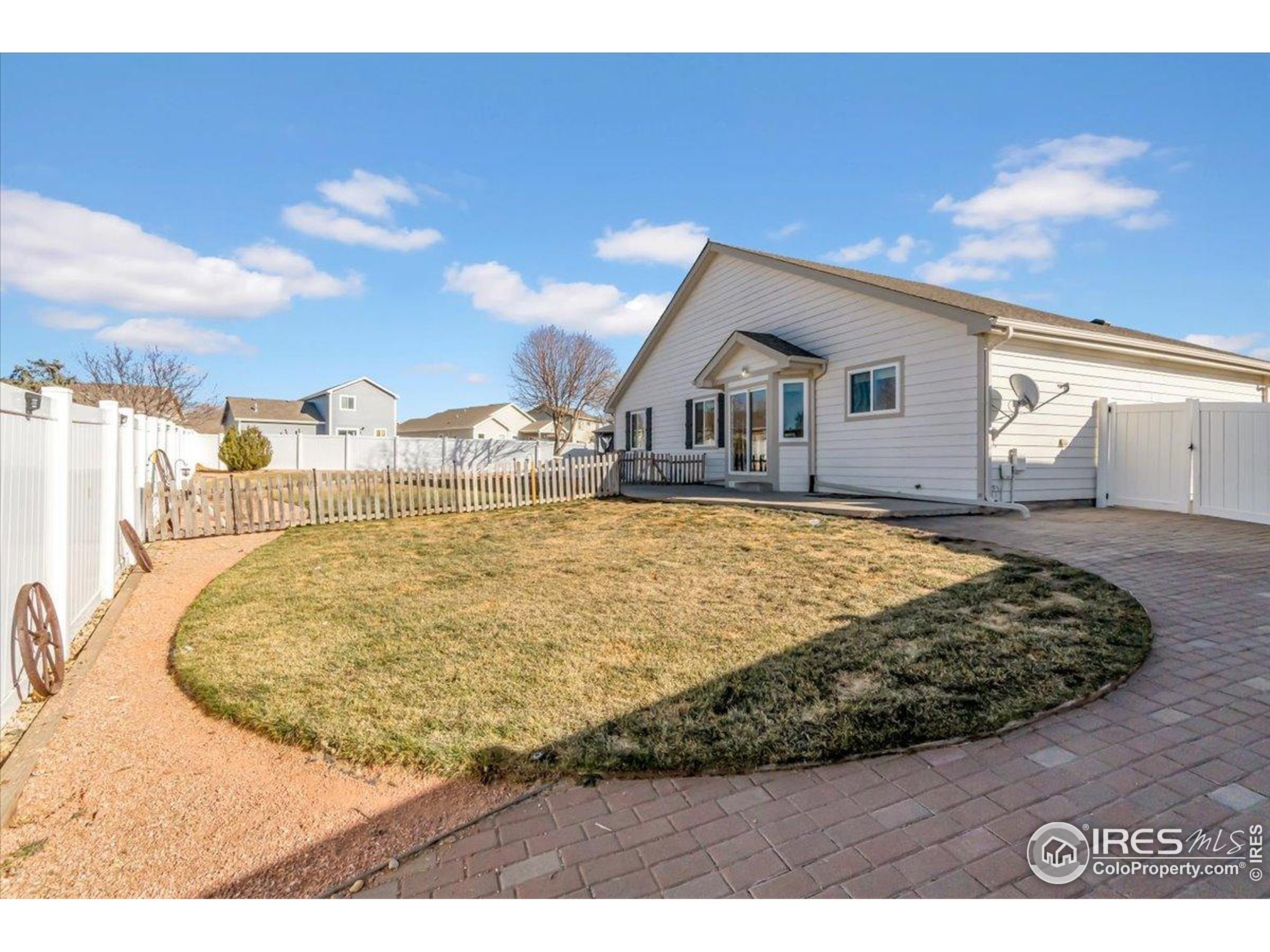 3411 Riesling Court Evans, CO 80634 - Photo 22 of 43 a house view with a outdoor space