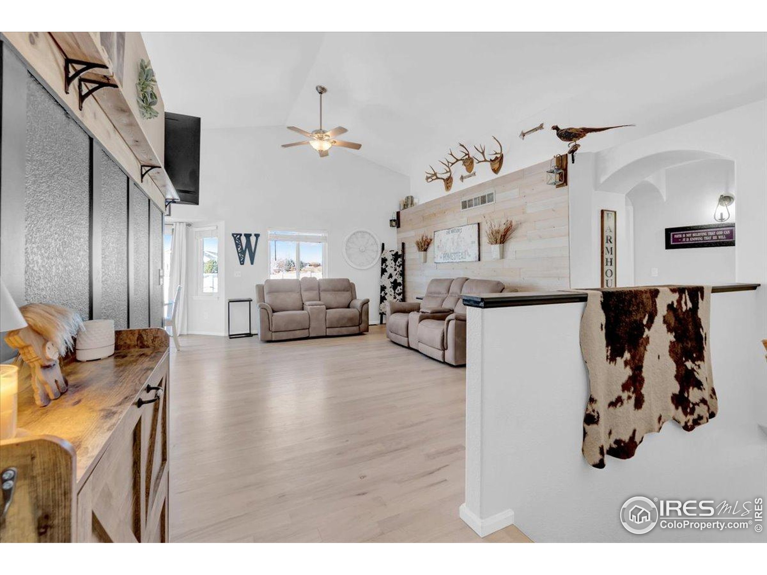 3411 Riesling Court Evans, CO 80634 - Photo 4 of 43 a living room with furniture and kitchen view