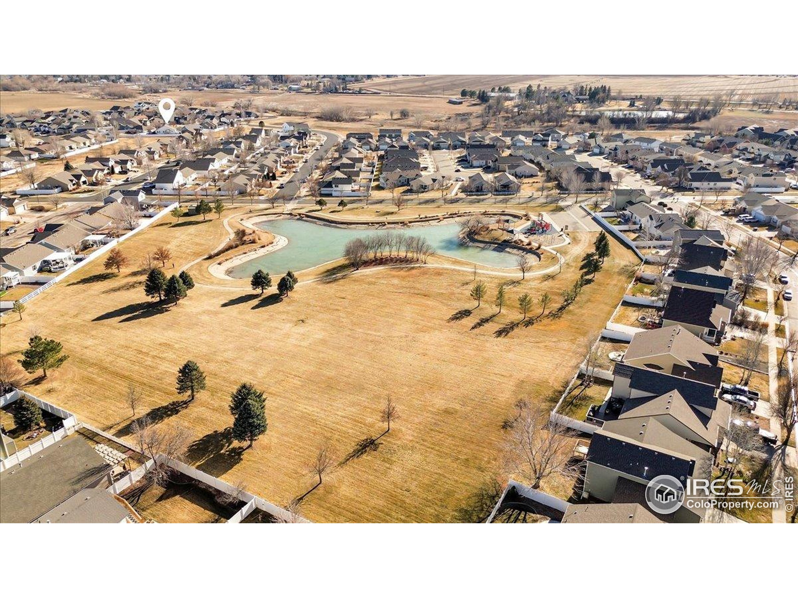 3411 Riesling Court Evans, CO 80634 - Photo 42 of 43 an aerial view of residential houses with outdoor space