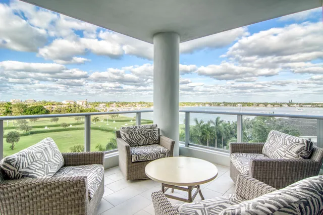 a outdoor living space with furniture and city view