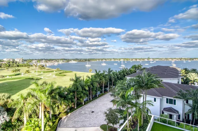 a view of a lake with a building in the background
