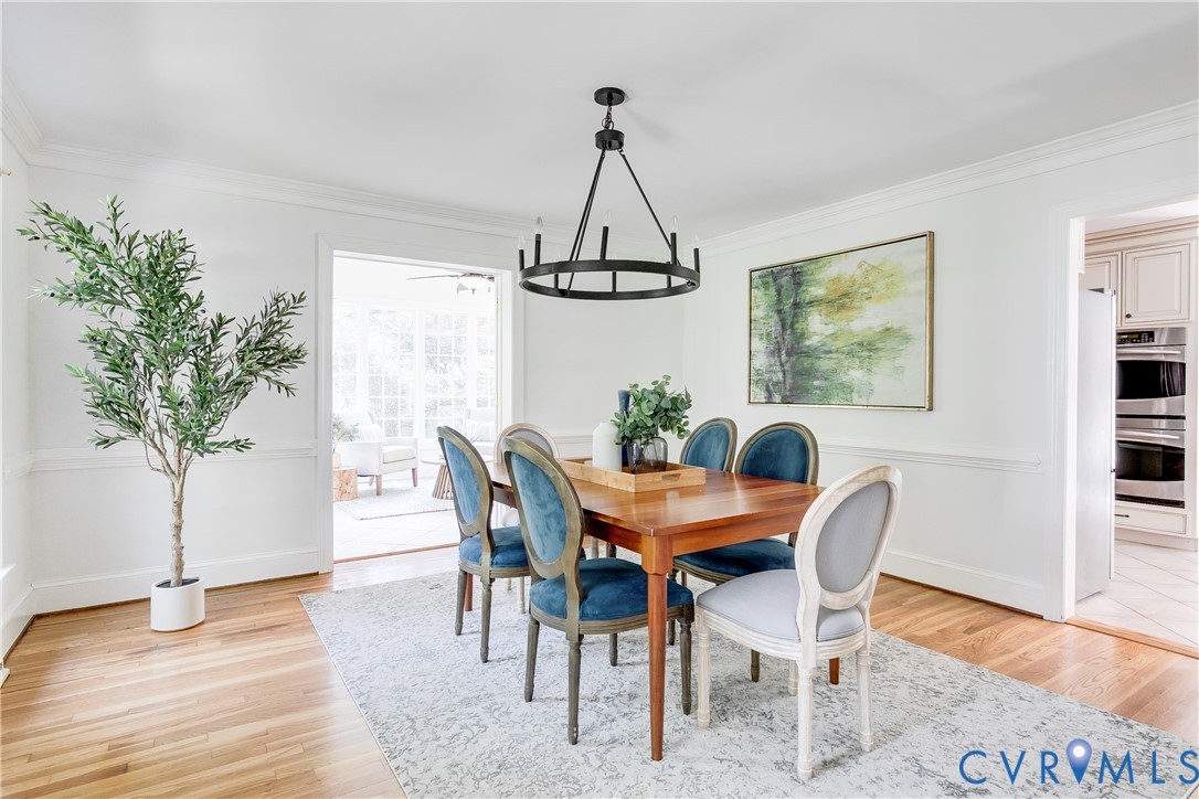 509 Wadeward Road Henrico, VA 23229 - Photo 10 of 59 a dining room with furniture and wooden floor