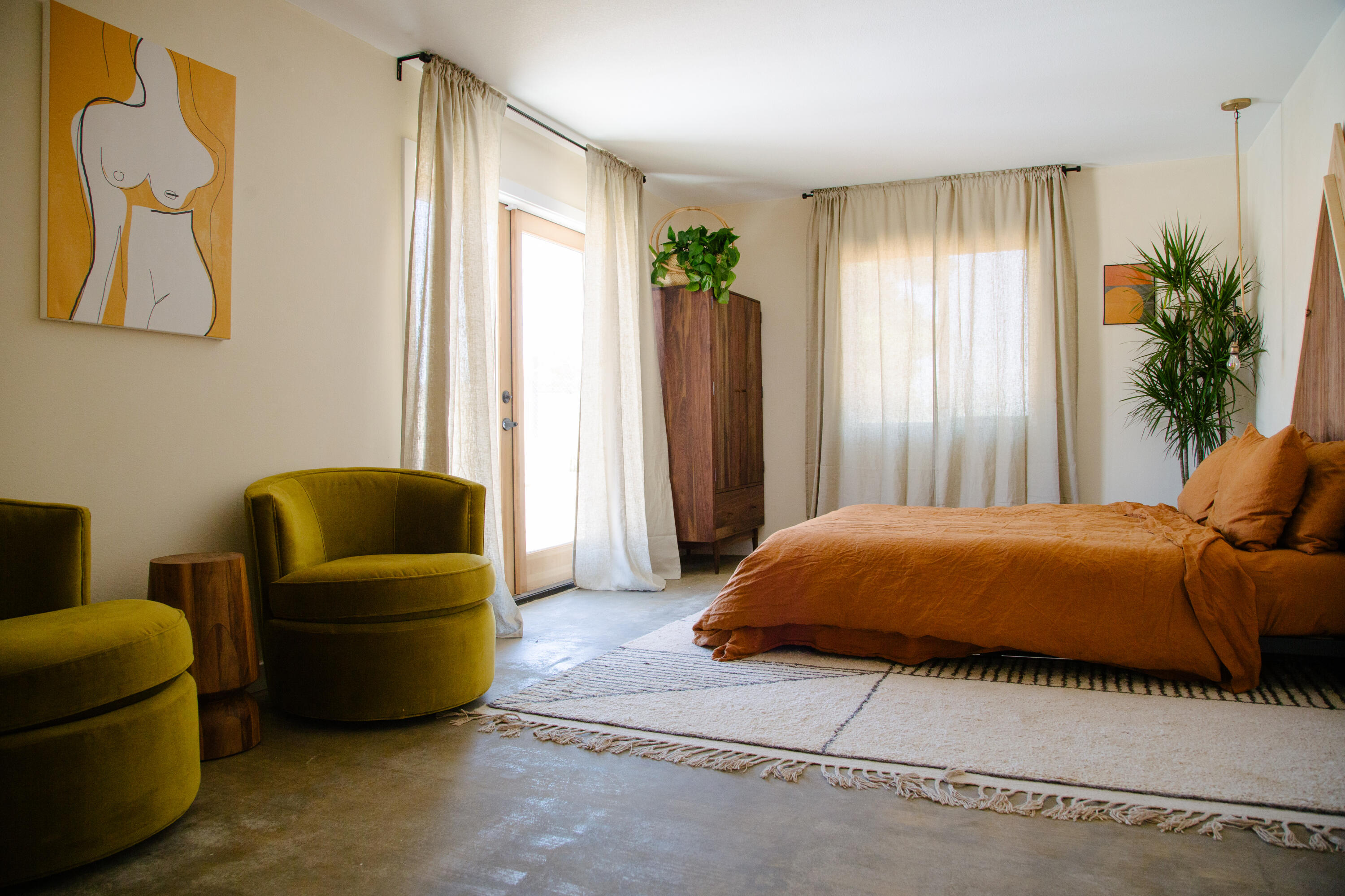 382 Cherokee Trail Yucca Valley, CA 92284 - Photo 38 of 66 a bedroom with a bed couch and window