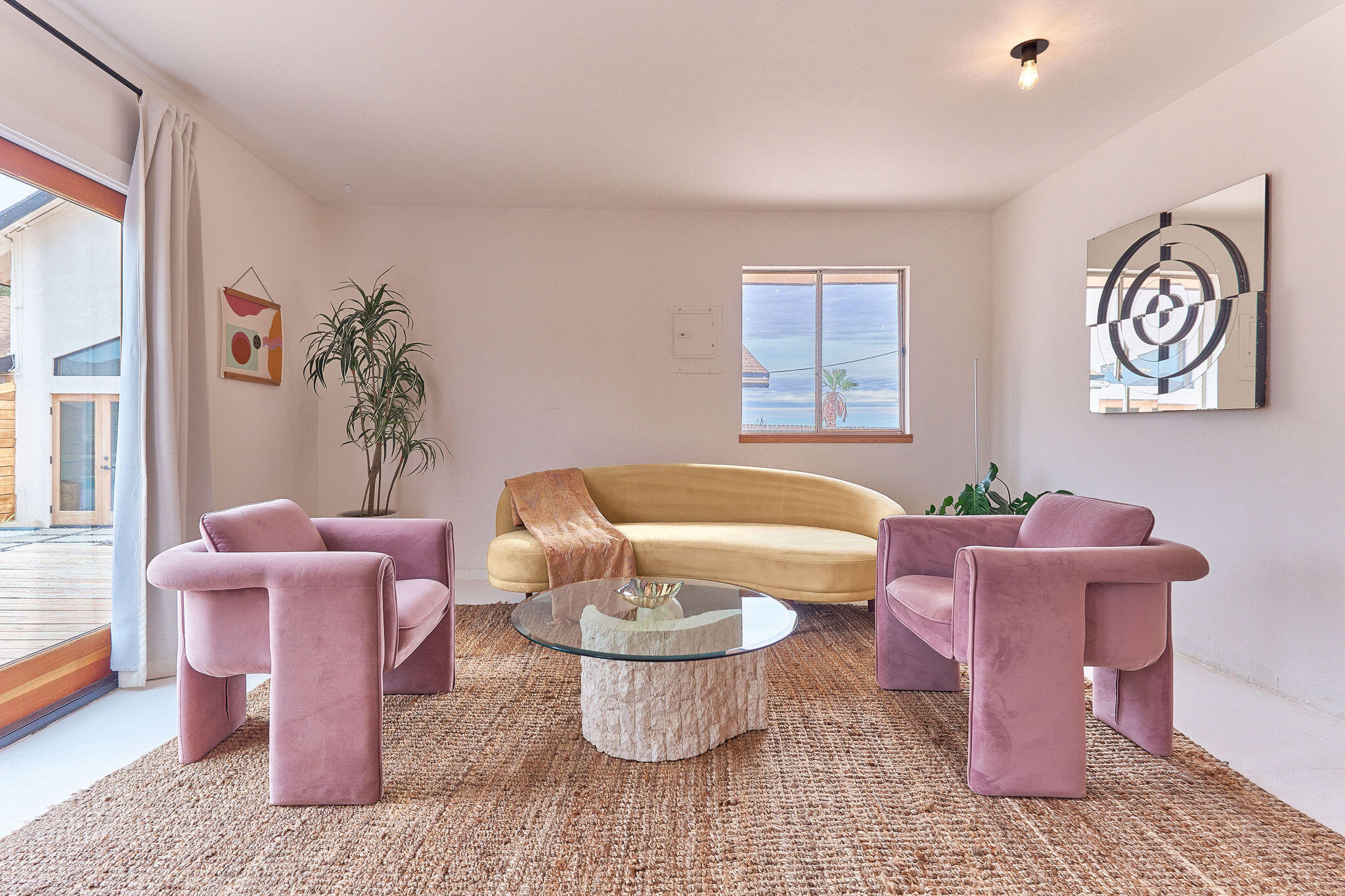 382 Cherokee Trail Yucca Valley, CA 92284 - Photo 50 of 66 a living room with furniture a rug and a window