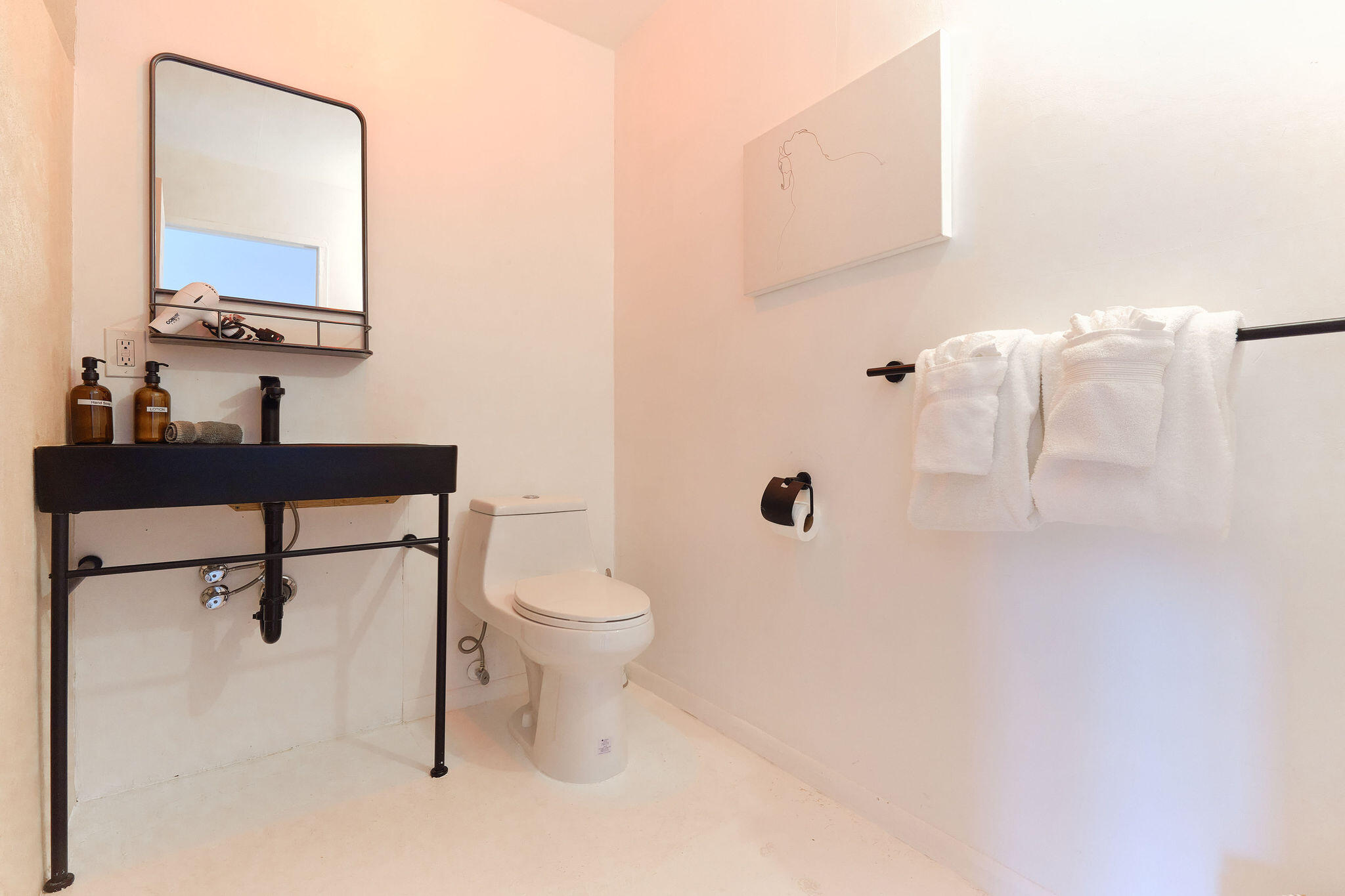 382 Cherokee Trail Yucca Valley, CA 92284 - Photo 54 of 66 a bathroom with a toilet sink and a mirror