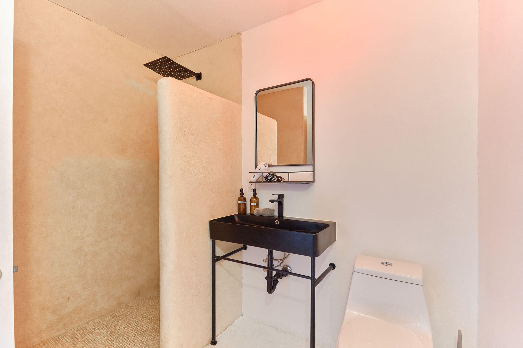 382 Cherokee Trail Yucca Valley, CA 92284 - Photo 55 of 66 a bathroom with a toilet a sink and mirror