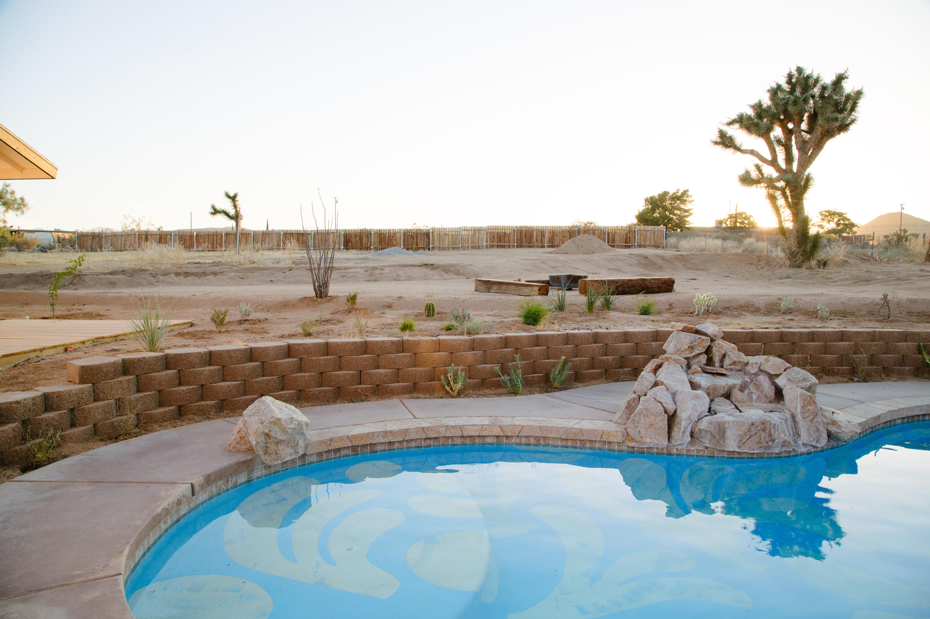 382 Cherokee Trail Yucca Valley, CA 92284 - Photo 56 of 66 a view of a swimming pool with an ocean view
