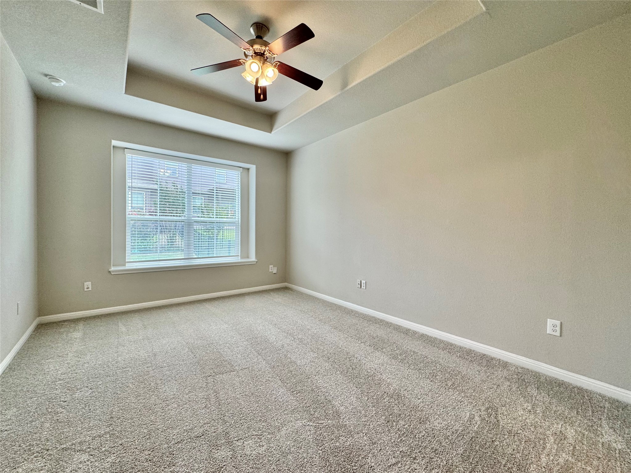 407 Rhetoric Way Pflugerville, TX 78660 - Photo 27 of 38 a view of an empty room with a window