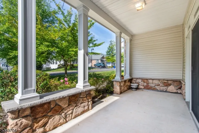 a view of a garden with an outdoor seating