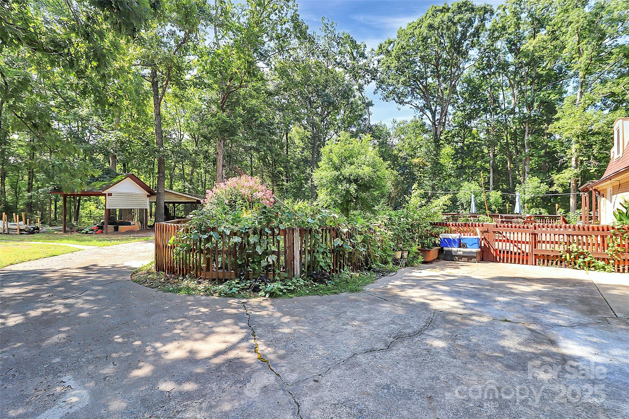 1940 Rock Hill Church Road Indian Trail, NC 28079 - Photo 16 of 46 a view of a house with large trees and park