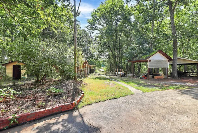 a view of swimming pool with a patio
