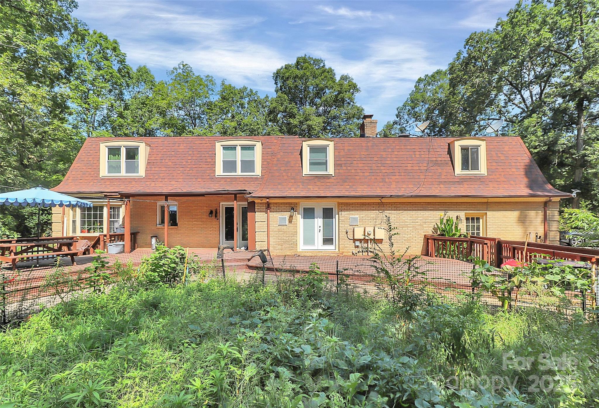 1940 Rock Hill Church Road Indian Trail, NC 28079 - Photo 27 of 46 an aerial view of a house with garden space and a street view