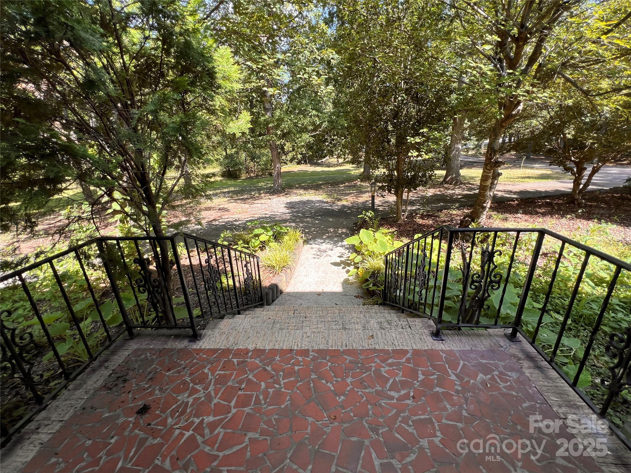 1940 Rock Hill Church Road Indian Trail, NC 28079 - Photo 28 of 46 a view of a pathway with a yard
