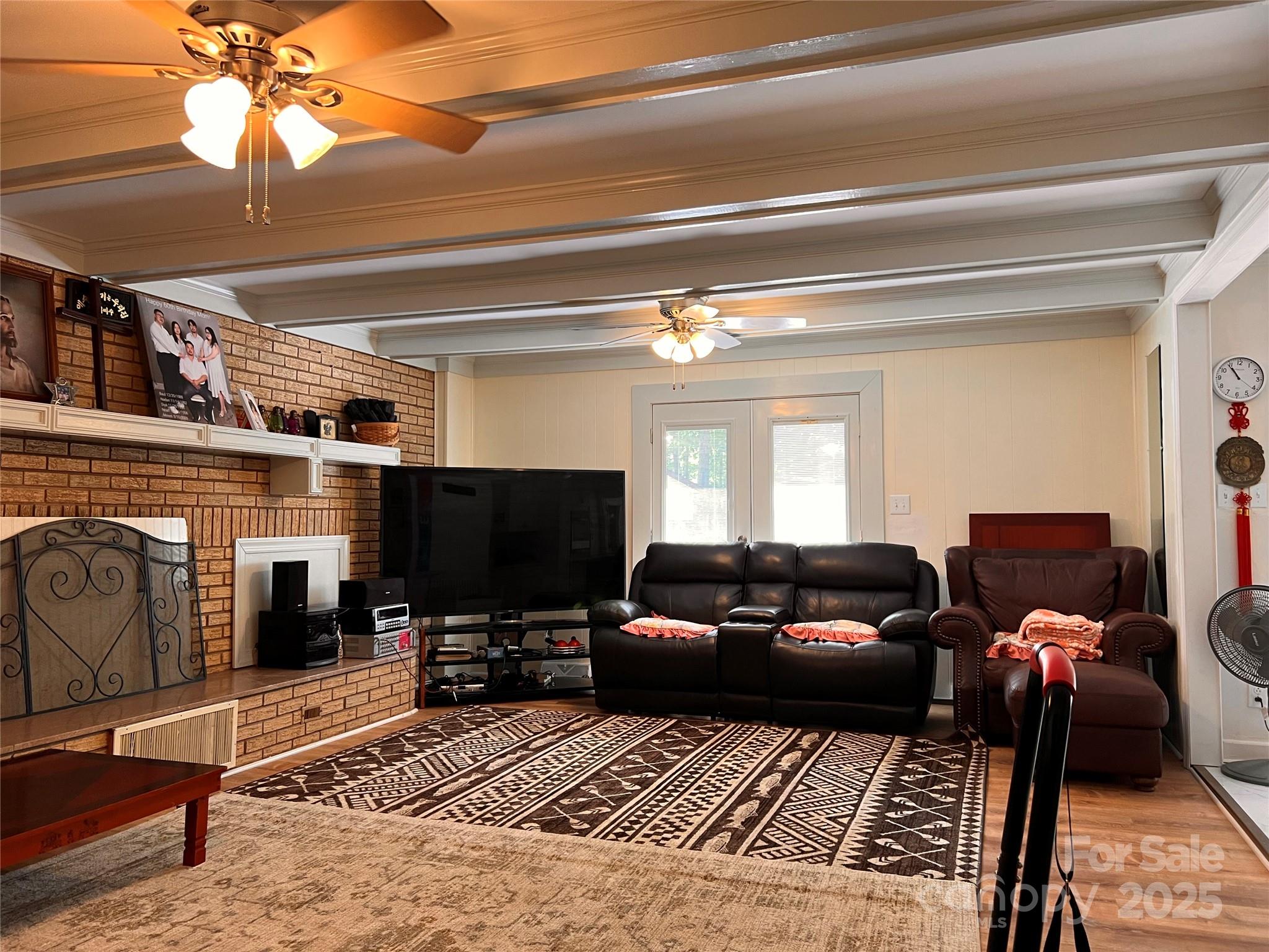 1940 Rock Hill Church Road Indian Trail, NC 28079 - Photo 44 of 46 a living room with furniture and a flat screen tv