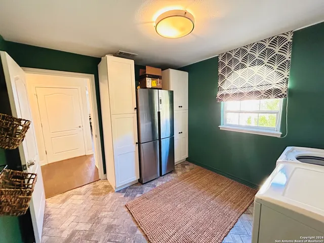 a room with window and a wooden floor