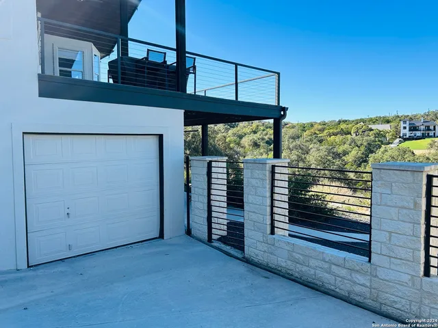 a view of a room that has a large window