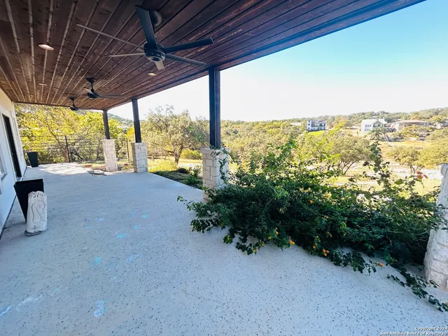 a view of a room with mountain and outdoor space