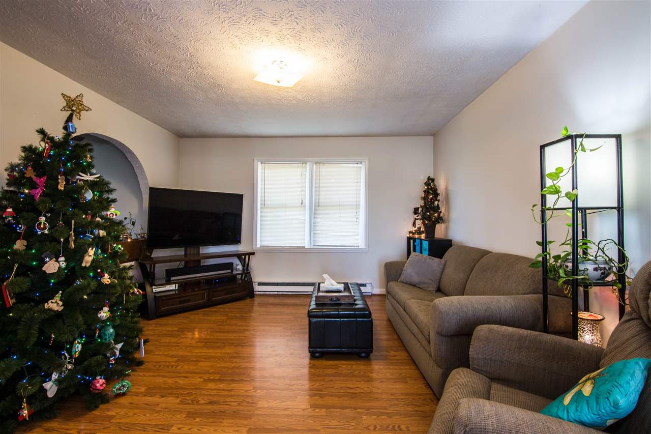 2564 Honey Run Road Dayton, VA 22821 - Photo 3 of 15 a living room with furniture and a flat screen tv