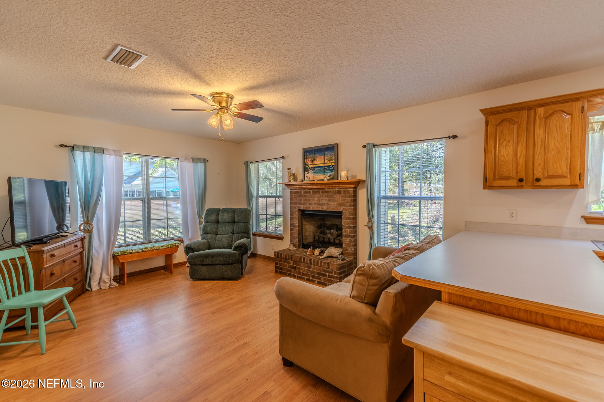1801 Lake Road Jacksonville, FL 32226 - Photo 24 of 72 a living room with furniture and a fireplace
