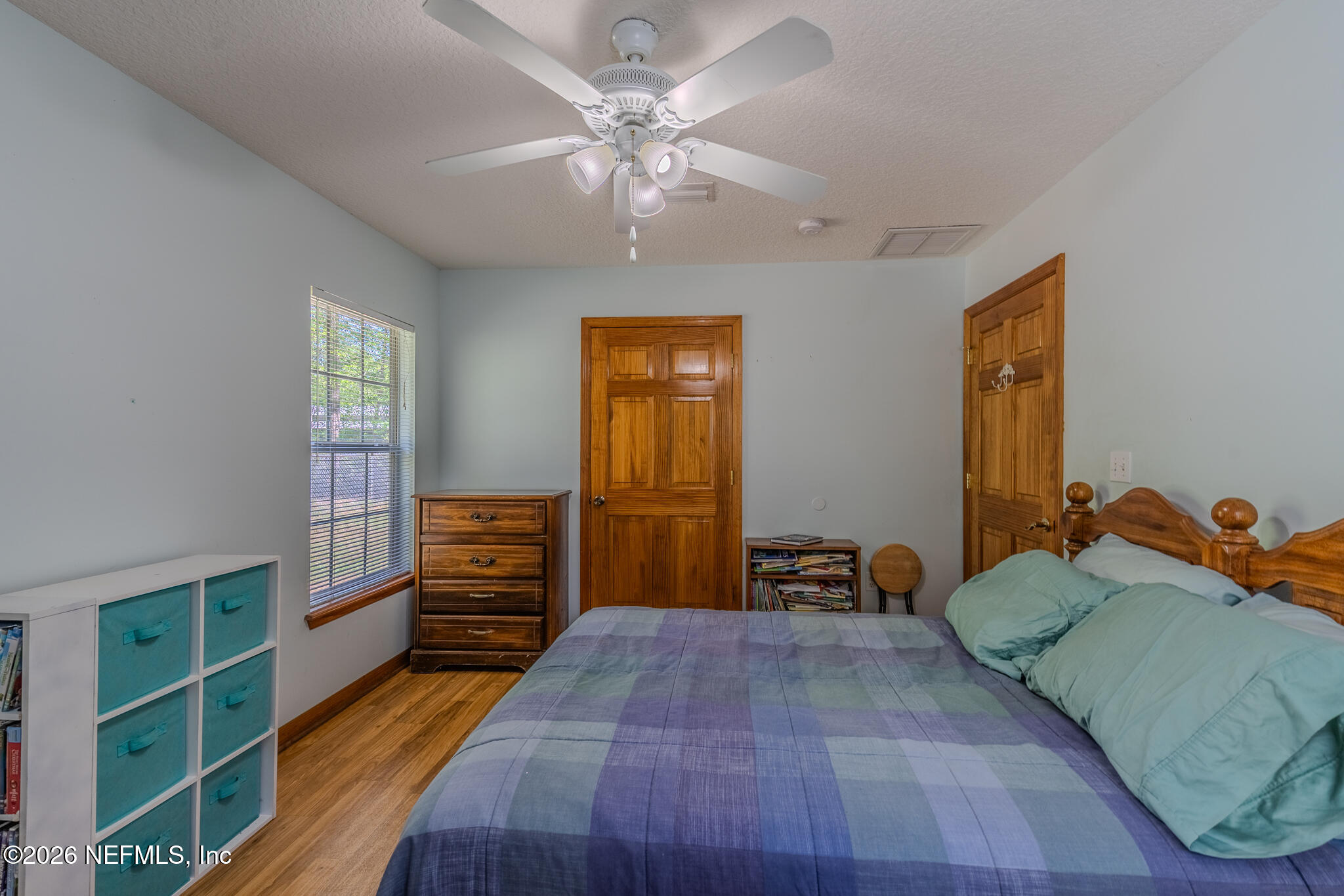1801 Lake Road Jacksonville, FL 32226 - Photo 29 of 72 a bedroom with furniture and a window
