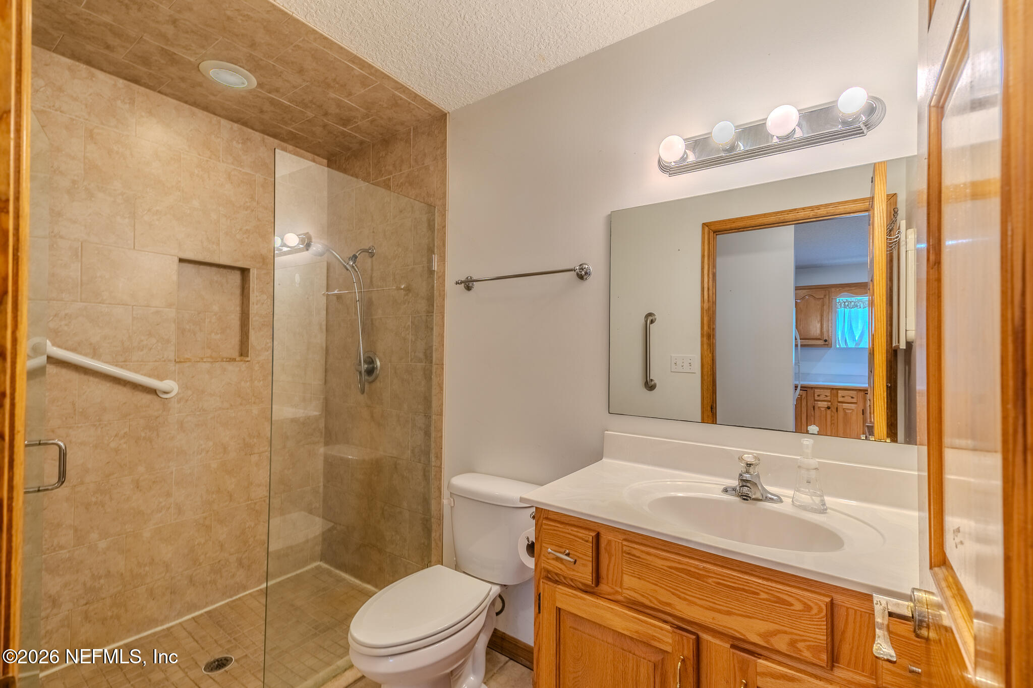 1801 Lake Road Jacksonville, FL 32226 - Photo 30 of 72 a bathroom with a sink a toilet and shower