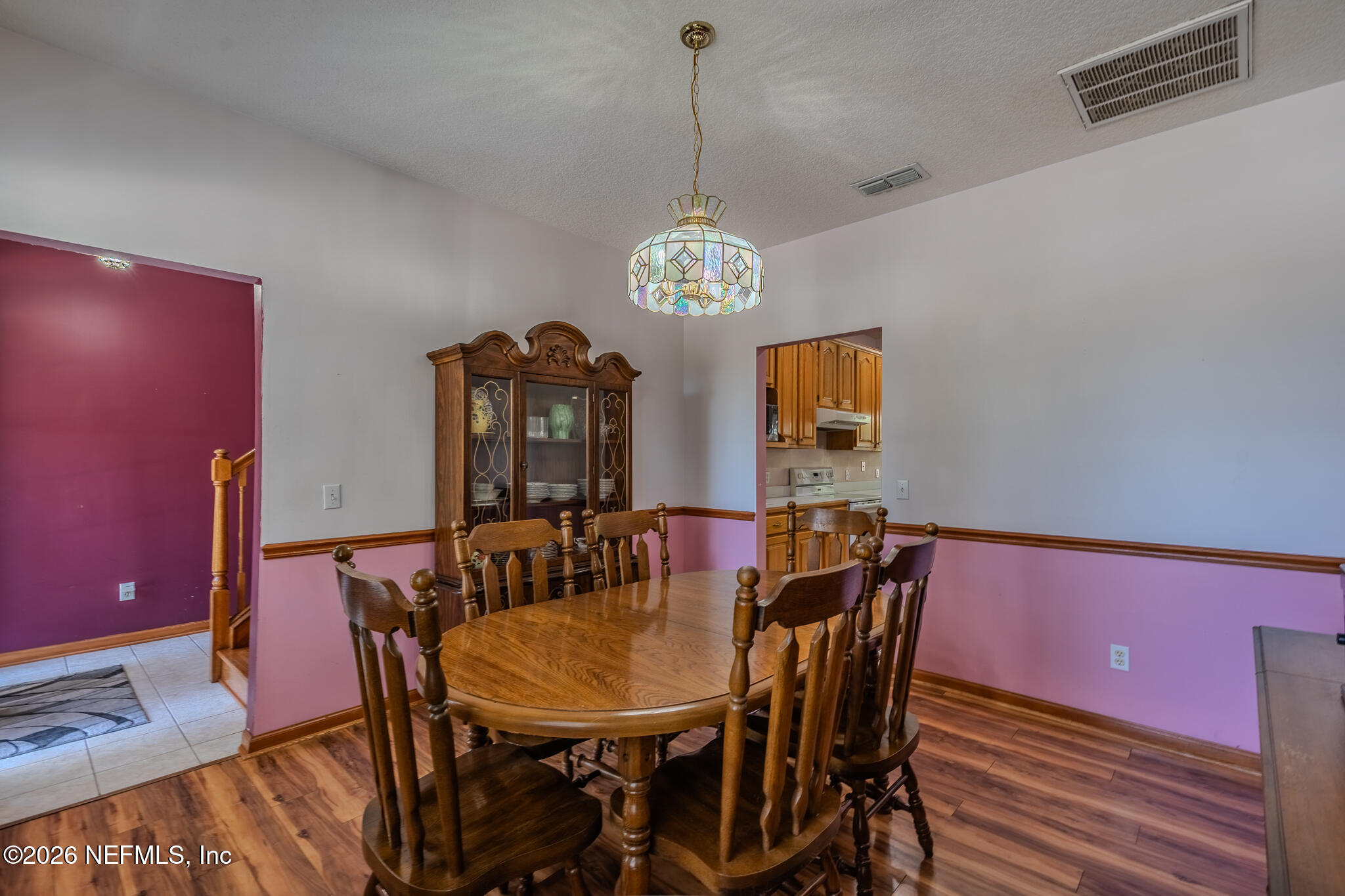 1801 Lake Road Jacksonville, FL 32226 - Photo 42 of 72 a view of a dining room with furniture and chandelier