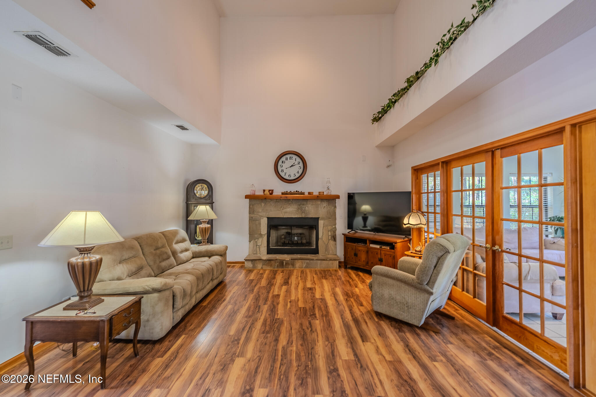 1801 Lake Road Jacksonville, FL 32226 - Photo 50 of 72 a living room with furniture and a fireplace
