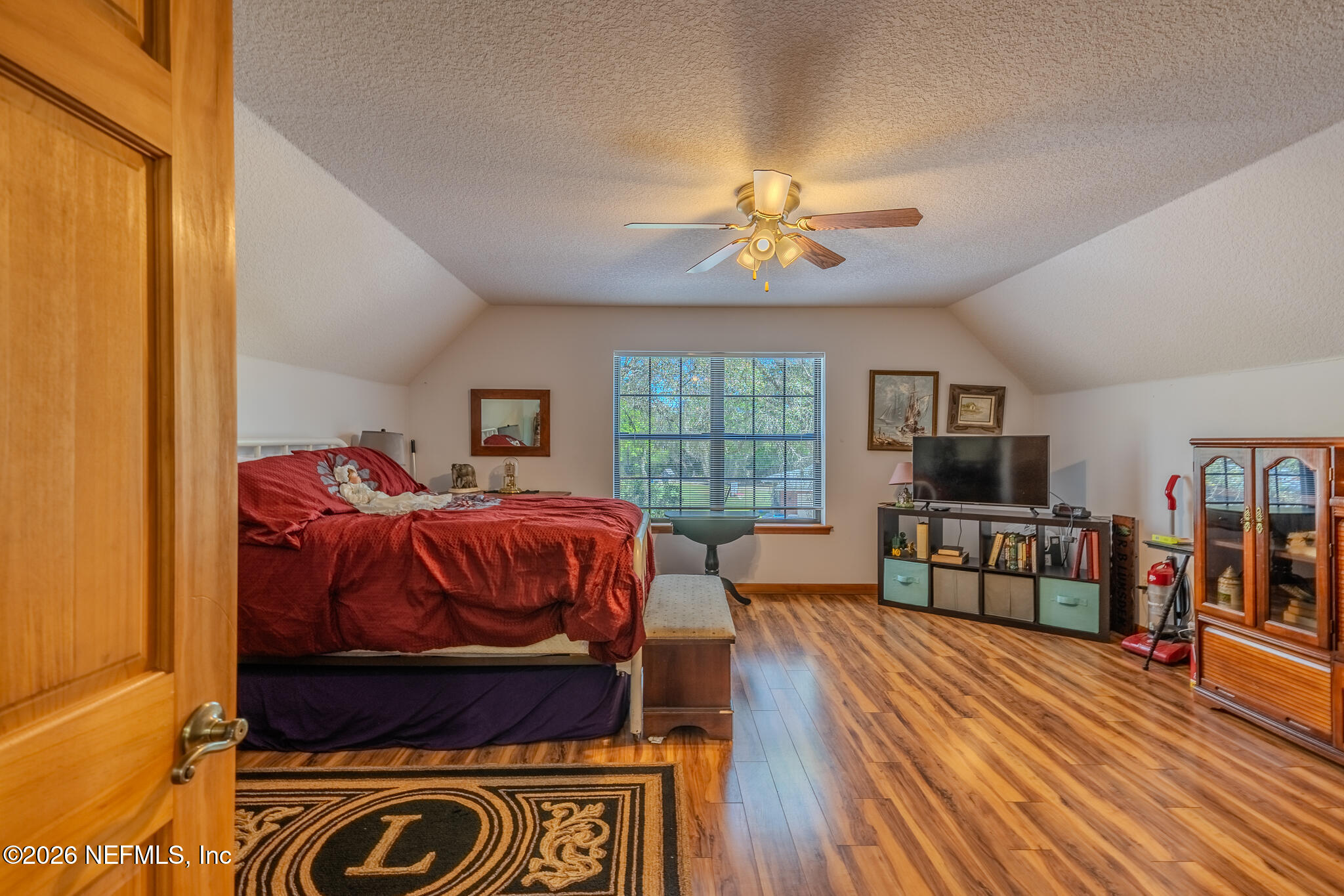 1801 Lake Road Jacksonville, FL 32226 - Photo 71 of 72 a living room with furniture and a flat screen tv