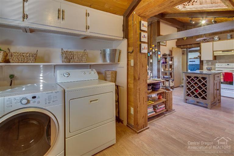 67170 Gist Road Bend, OR 97703 - Photo 15 of 25 A large laundry - pantry room is conveni