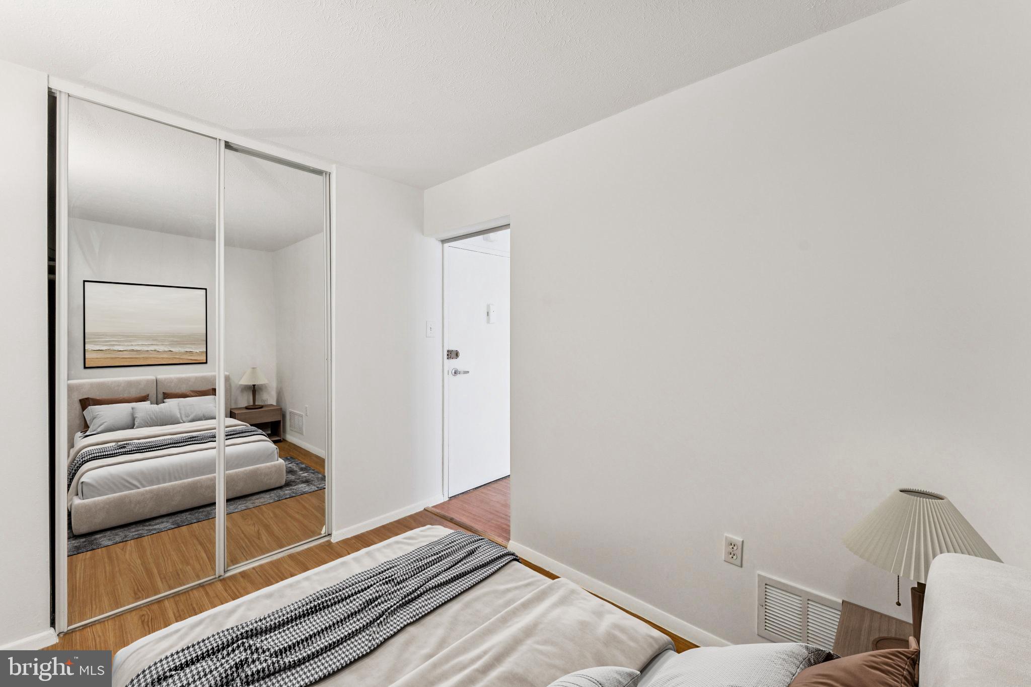 1440 N Street Northwest, Unit 312 Washington, DC 20005 - Photo 16 of 31 a bedroom with a bed and the view of bathroom