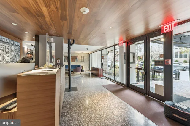 a view of lobby with furniture and floor to ceiling window