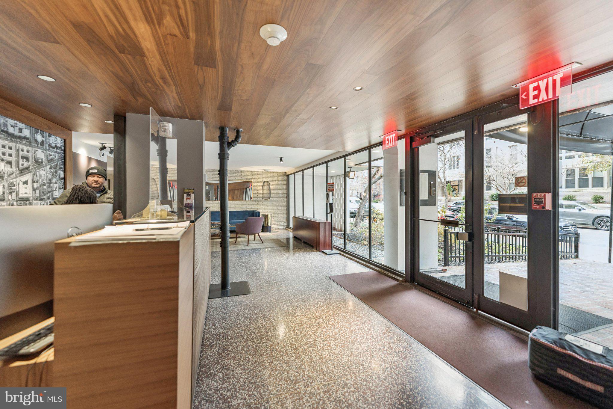 1440 N Street Northwest, Unit 312 Washington, DC 20005 - Photo 20 of 31 a view of lobby with furniture and floor to ceiling window