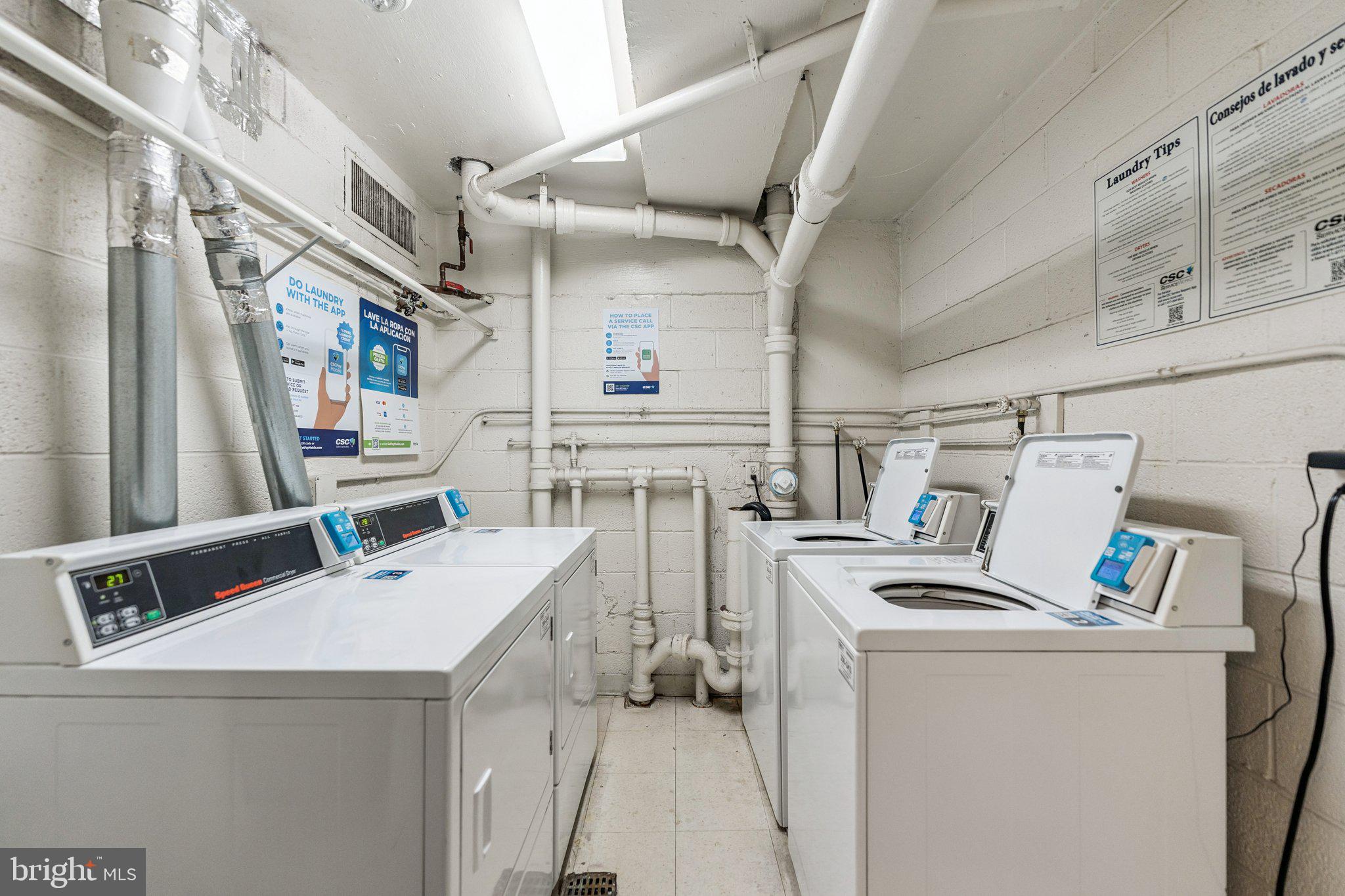 1440 N Street Northwest, Unit 312 Washington, DC 20005 - Photo 23 of 31 a utility room with dryer and washer