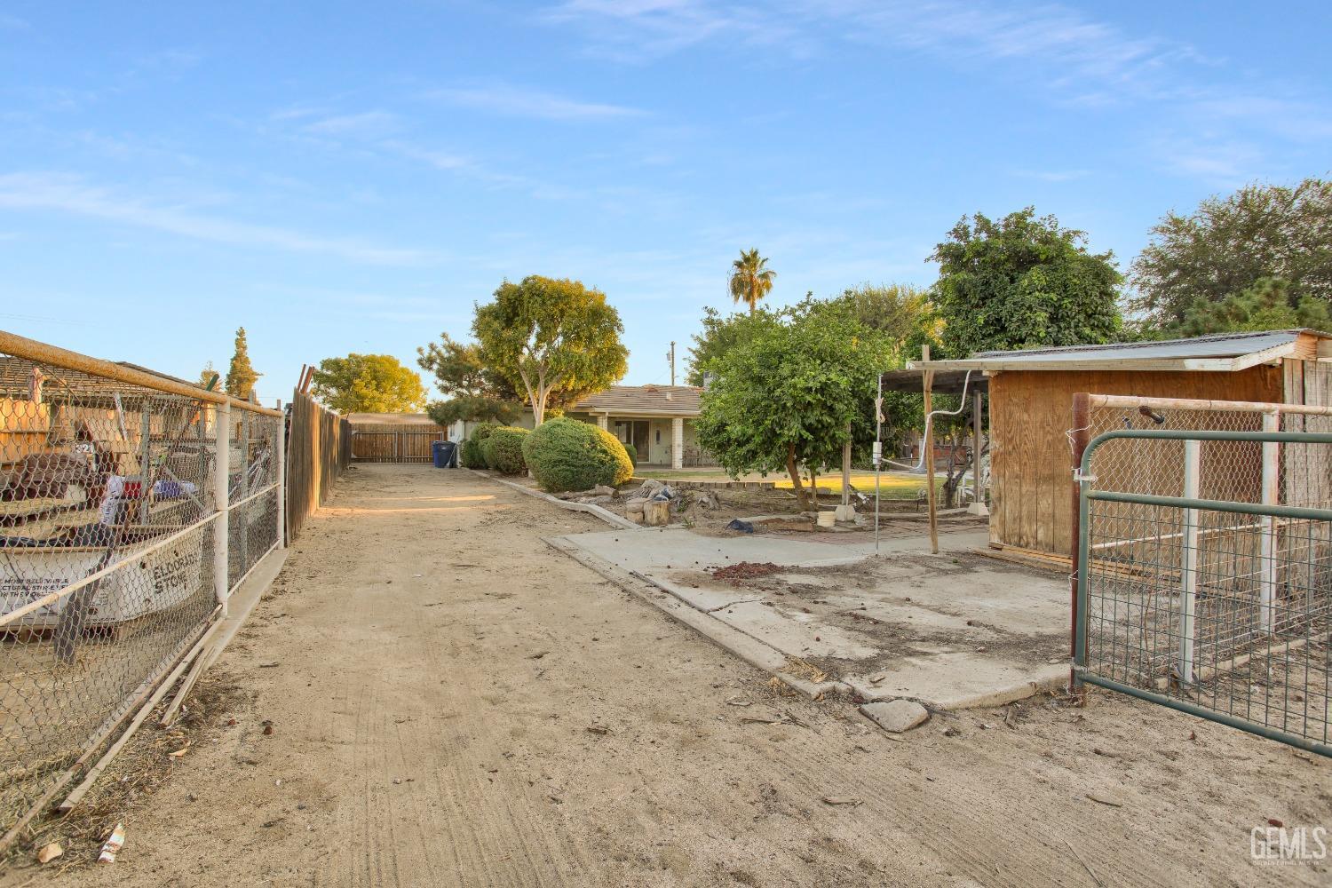 Undisclosed Address Bakersfield, CA 93312 - Photo 23 of 26 a view of a backyard
