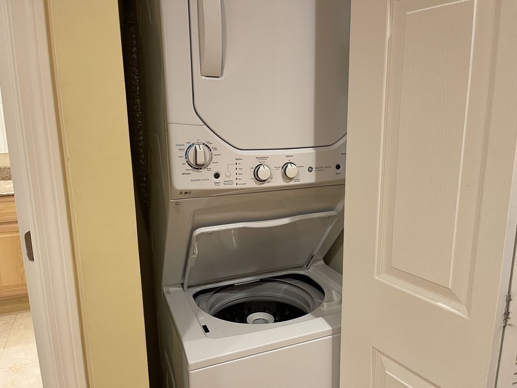 20 Webster Street, Unit 405 Brookline, MA 02446 - Photo 11 of 22 a utility room with dryer and washer