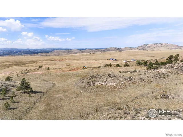 a view of an ocean beach and mountain