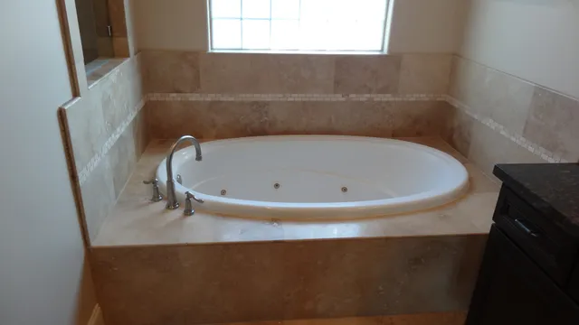 a bathroom with sinks and mirror