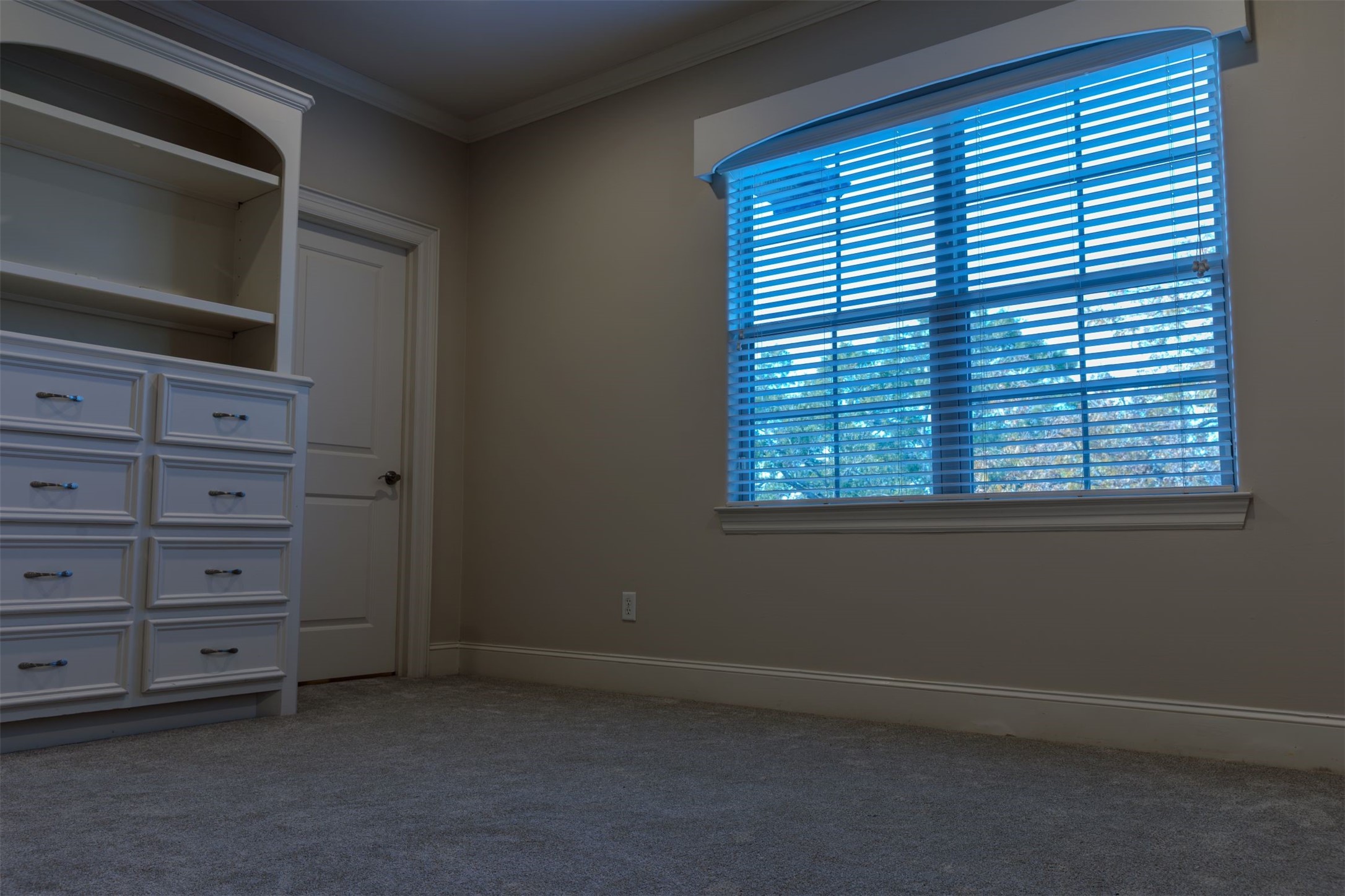 2101 Elmen Street Houston, TX 77019 - Photo 18 of 27 a view of an empty room with a window